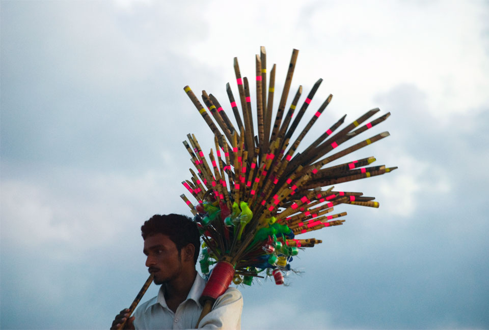 Picture of a flute vendor in India
